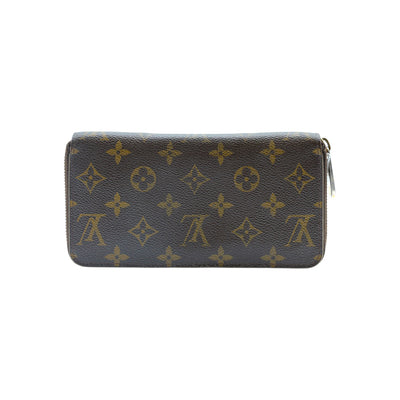Louis Vuitton Monogram Zippy Round Leather Wallet in Brown