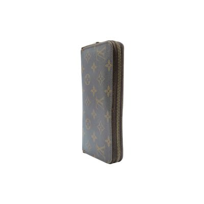 Louis Vuitton Monogram Zippy Round Leather Wallet in Brown