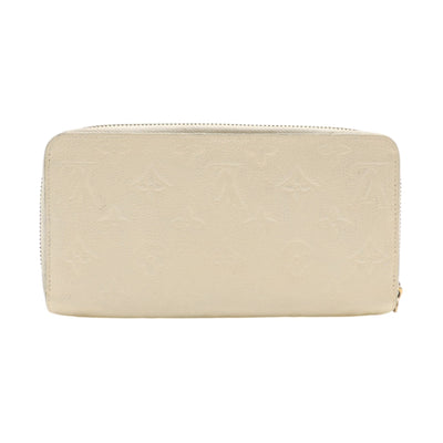 Louis Vuitton Monogram Empreinte Leather Zippy Wallet In Cream