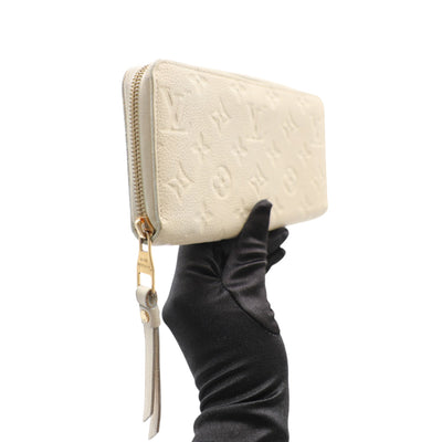 Louis Vuitton Monogram Empreinte Leather Zippy Wallet In Cream