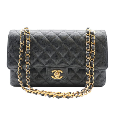 CHANEL Double Flap Medium Caviar Leather Bag In Black