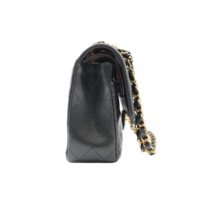 CHANEL Double Flap Medium Caviar Leather Bag In Black