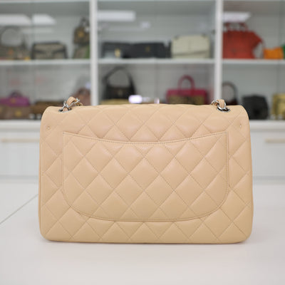 CHANEL Double Flap Jumbo Lambskin Leather Bag In Beige