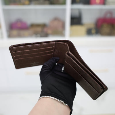 Louis Vuitton Multiple Wallet Taiga Leather In Dark Brown