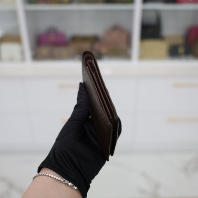 Louis Vuitton Multiple Wallet Taiga Leather In Dark Brown