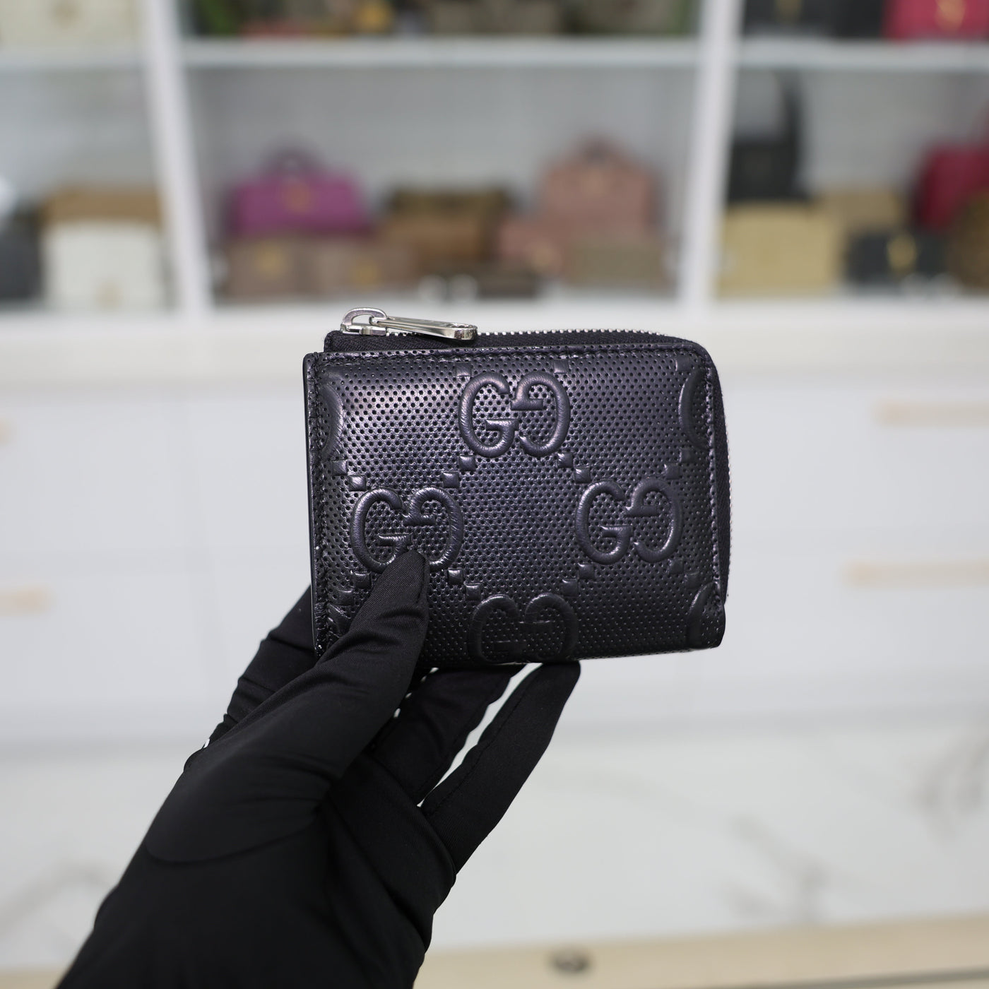 Gucci GG Embossed Leather Zip Around Wallet In Black