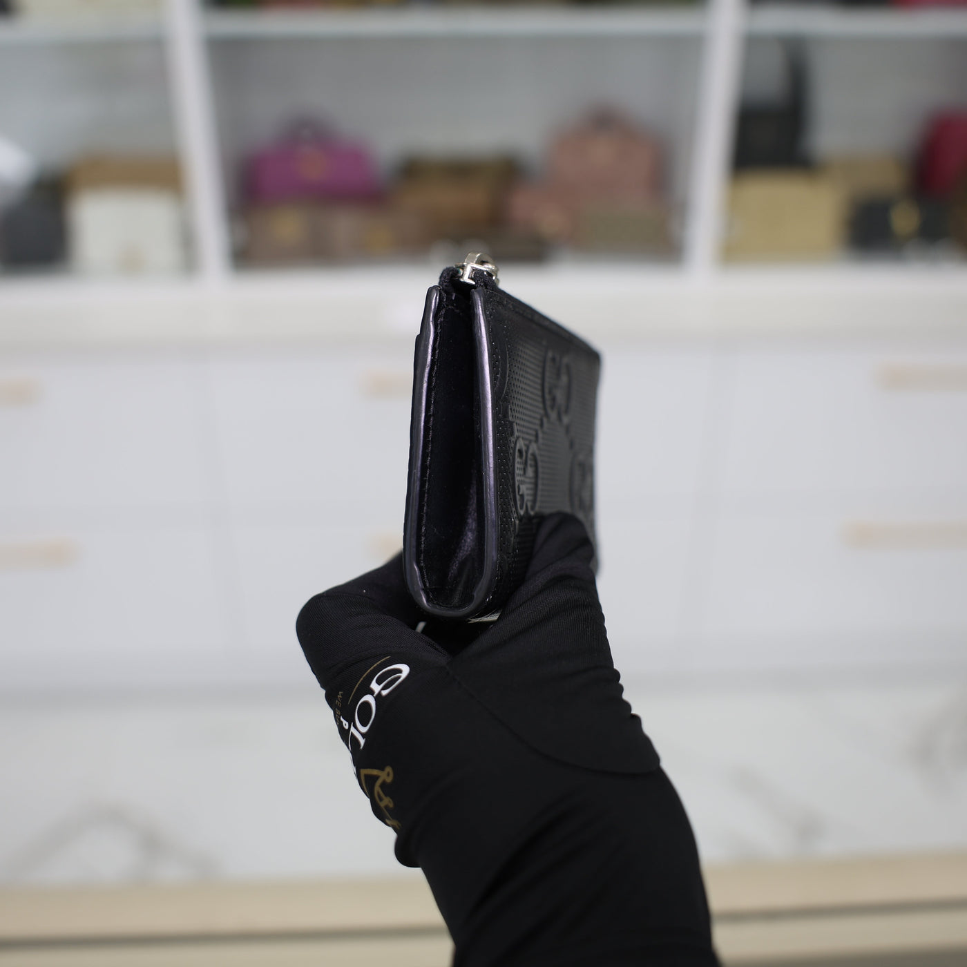 Gucci GG Embossed Leather Zip Around Wallet In Black