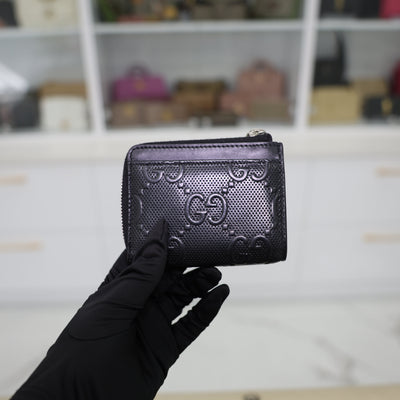Gucci GG Embossed Leather Zip Around Wallet In Black
